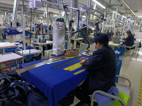 全省服装产业高质量发展推进会现场观摩劳动保护用品生产